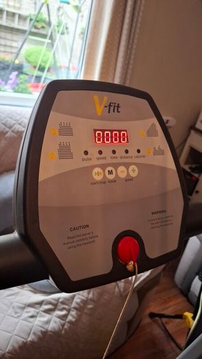 V-fit folding treadmill on wheels