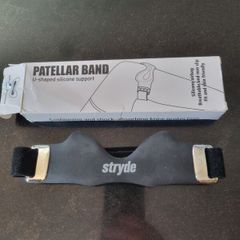 Stryde knee shock absorbing strap