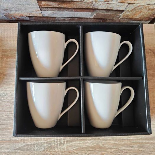 Four white mugs