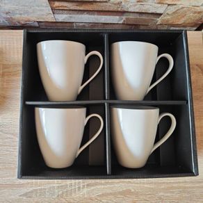 Four white mugs