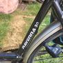 ladies bike with carrier bags and lock Image 2