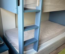 Kids bunk bed with storage