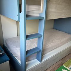 Kids bunk bed with storage