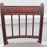 Two vintage mahogany dining chair with a pediment-style top rail, turned spindle back and turned front legs seat in a textured gray fabric Image 5