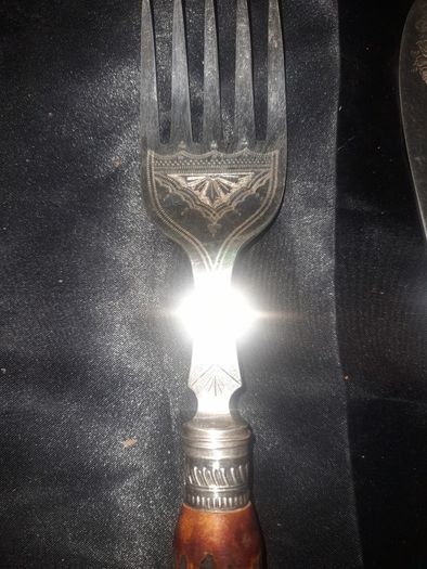 A Pair of Antique Victorian Era Fish Servers with Antler Handles and Engraved Silver Plated Blades, Commonly made in Sheffield in the late 19th Century
