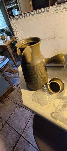 2 different itemes- 1-1960s Langley Sherwood Coffee Pot but stmpe been gone 60.00 euro.2- Ceramic Plant pot or vase 628/14 Made In Germany. 18.00 euro.