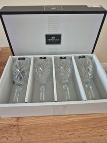 Newgrange new in box 4 wine glasses