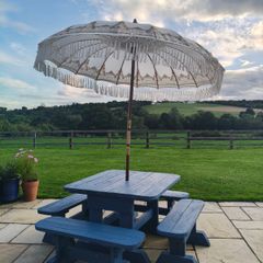 Large garden table and 4 bench chairs