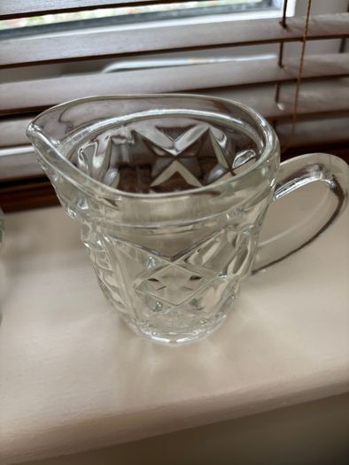 A bundle of vintage - retro pieces, Carnival Glass , Anchor Hocking Fire King, Large Ribbed Glass Butter Dish, Citrus Juicer, Three Footed Glass Sugar Bowl and Jug