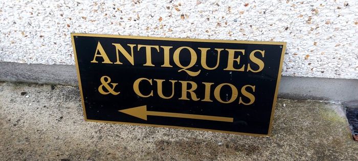 Antiques & Curios,hard plastic sign perspex. ,unusual and lovely colours,,32 inches length, 16 inches height,,buyer collects, see pictures for condition, used condition few marks nicks