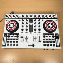 Native Instruments Traktor Kontrol S4 DJ controller -- NOT FULLY TESTED.