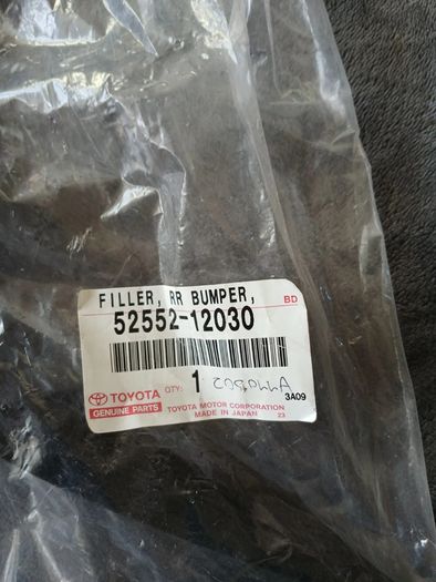 Genuine Toyota Corolla Ae10, 92-97 Part 52552-12030 (filler, Rear Bumper, Rh)