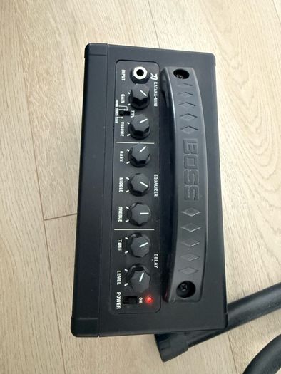 Squier stratocaster by fender, Boss amp and accessories