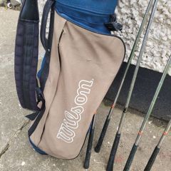 golf clubs old but in great condition. With bag tees and a couple of old balls