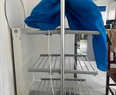 Heated cloth airer