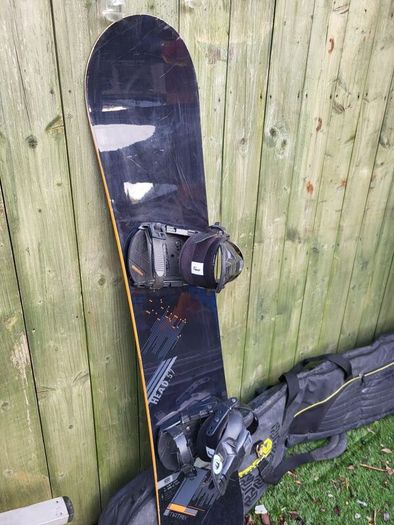 snowboard, bindings and bag