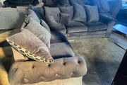 Grey corner sofa with scatter cushions