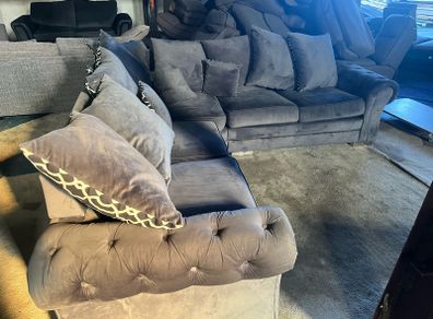 Grey corner sofa with scatter cushions