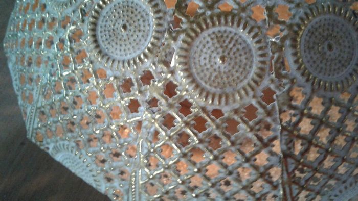 Decorative metal candle holder