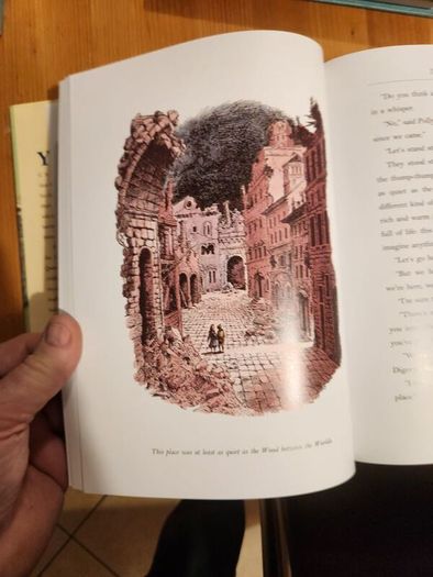 The Chronicals Of Narnia Compilation.  2 Books In Presentation Folder. Large Volume Hardback In Very Good Condition.