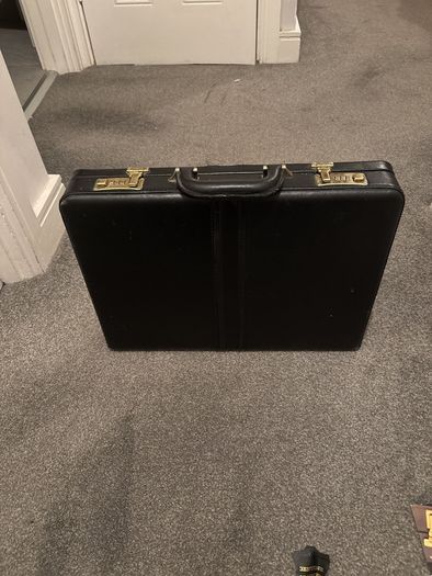 Black Leather Brief Case good as new