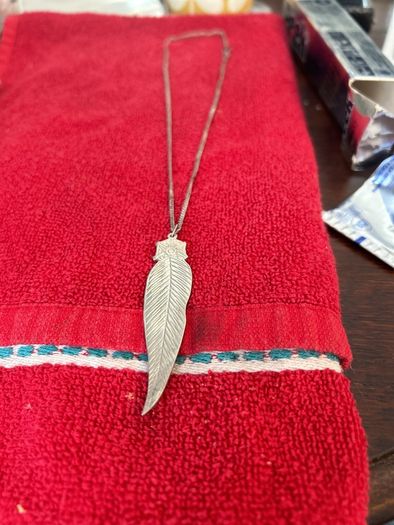 silver feather pendant and chain