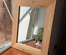 Mirror in wooden frame