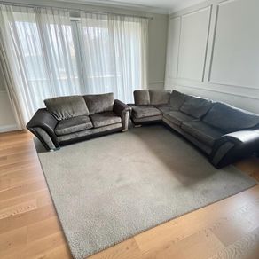 Black corner sofa with matching 2 seater