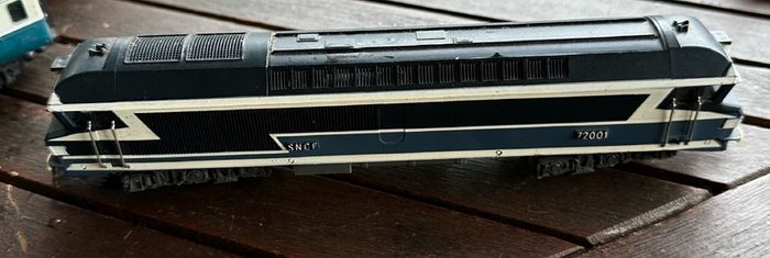 This engine is a vintage Jouef OO scale (1/87) SNCF CC 72001 diesel model locomotive featuring the classic French railway blue and white livery.