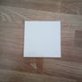 almost full box of white square tiles Image 2