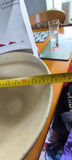 Large Angular Beige speckled ceramic bowl with a wide conical flare and a dark brawn contrasting base By Paul Costelloe.