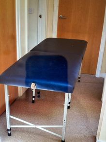 Massage table