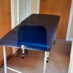Massage table