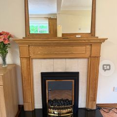 Oak fireplace surround black granite hearth