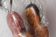 Unusual vintage bottle and opener in wrapping