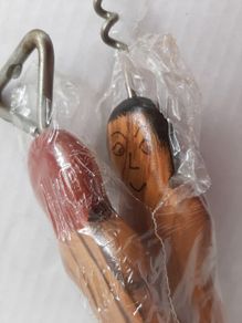 Unusual vintage bottle and opener in wrapping