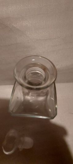 Art deco glass whiskey decanter with lid,,buyer collects or pays postage thank you, good patina condition,,sold as is, see pictures for condition,,