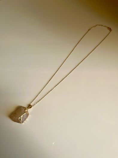 Costume necklace with stone pendant