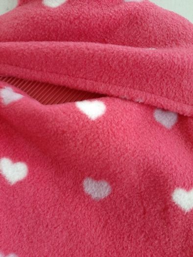 new hot water with pink cover tag attached