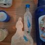 Empty holy water bottles and other religious items Image 3