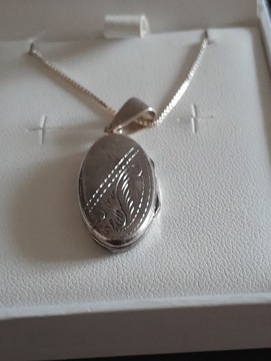 silver chain and locket