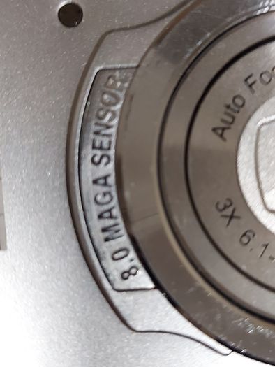 Z880 Digital Camera, Takes 2AA Batteries, working fine, has a modification that doesn't affect its performance