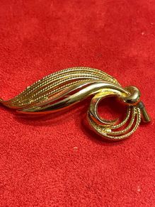 gold tone brooch
