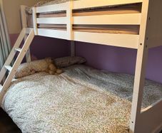 Triple bunk bed.