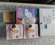 German Electric Breastfeeding Pump plus 3 packs of Breast pads