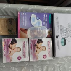 German Electric Breastfeeding Pump plus 3 packs of Breast pads