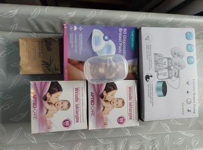 German Electric Breastfeeding Pump plus 3 packs of Breast pads