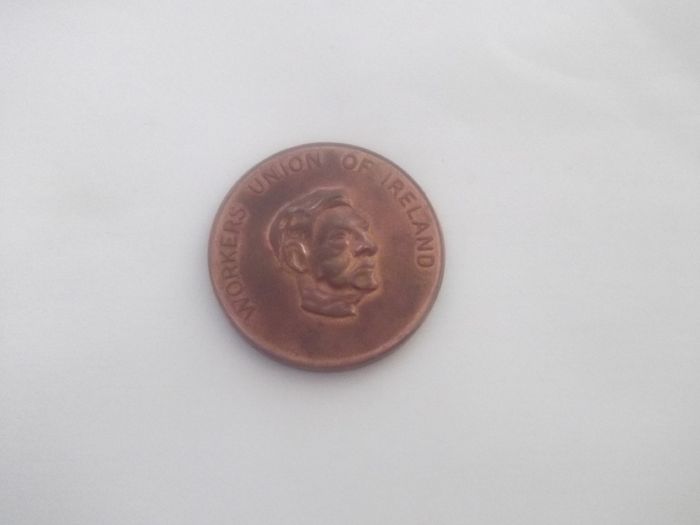 a vintage coin for workers union of ireland