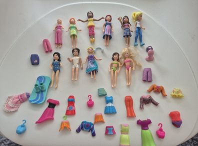 11 Polly Pocket dolls and accessories