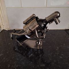 Novelty metal wine bottle holder